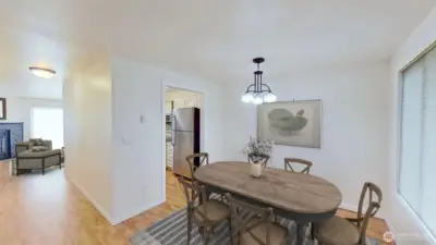 Dining area off the kitchen. Virtually staged.