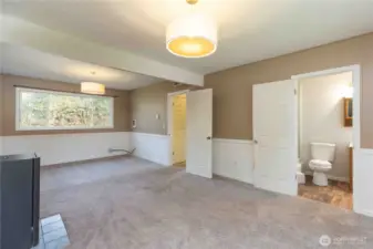 Large Family Room downstairs with 3/4 bathroom