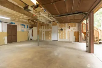 view of garage with access to backyard.