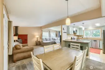 Open floor plan with cozy wood burning stove