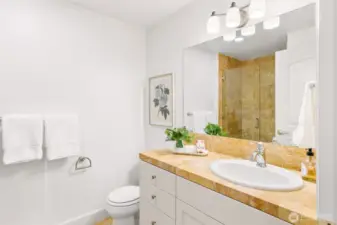 Spare bath with shower.