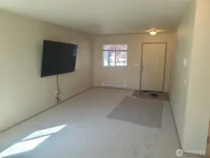 Living room with new carpet and paint