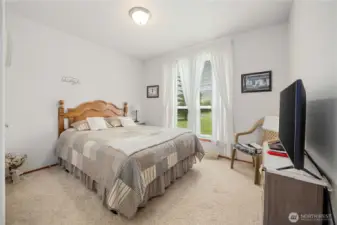 Across the hallway opposite the guest bath is the 2nd of the two guest bedrooms.