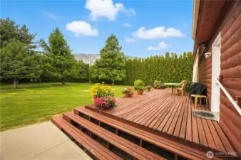 Parklike setting with a wrap around deck, providing space to sit back and enjoy Summer or Winter evenings.