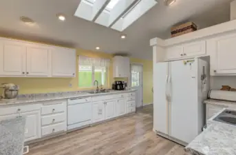 Imagine putting all this counterspace to use in this bright, beautiful Kitchen!