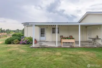 This lovely covered patio can also be entered directly from the garage!