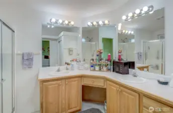 Primary bathroom offers a double vanity, oversized walk-in shower, and full-size linen closet!