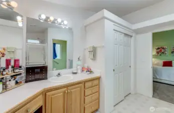Primary Bathroom offers so much storage, with a double vanity and full-size linen closet!