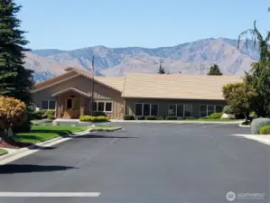 This community Clubhouse is a showpiece! Inside you will find the indoor pool and spa, fitness center, library, pool tables, vaulted ceilings, kitchen, restrooms, and a ton of gathering space!