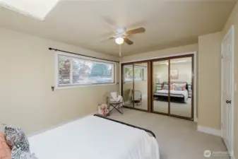 Primary bedroom with a double closet