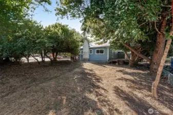 Large, corner lot with gated entrance on the side