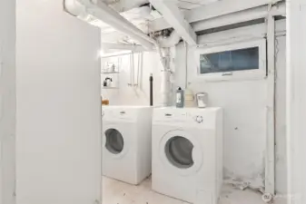 Laundry Room concept. Washer/Dryer are virtually staged