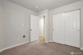 Bedroom #1 with double door reach-in closet