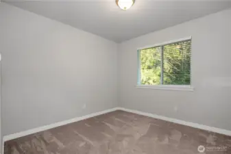 Bedroom #2 looking out to the side yard