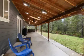 Covered porch with hot tub