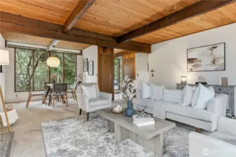 Another view of the living room looking toward the dining area and entry.