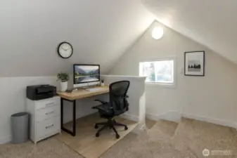 Upstairs loft area virtually staged as office space
