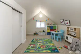 Upstairs bonus room virtually staged as bonus room