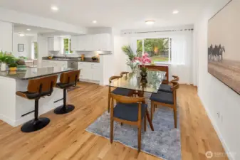 The west facing dining room sits just off your kitchen, adjacent to another large sitting area.