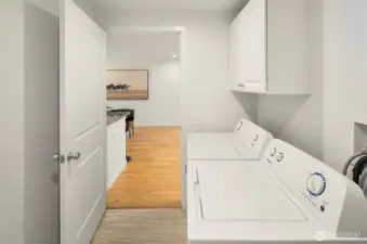 The utility room is a great size, housing your full sized washer/dryer and with space for storage.