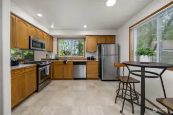 Kitchen greets you with stainless steel appliances