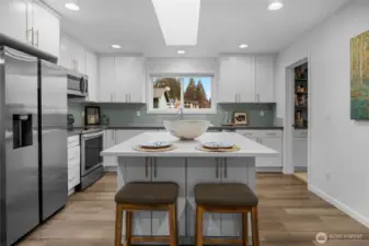 Alternate apartment kitchen view-door to the right is a walk-in pantry with stackable washer and dryer