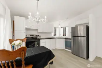 Brand new stainless appliances all stay, reflecting so nicely with the crystal lights!