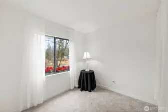 Bedroom 1, bright window, large closet. Could be an office to convert this home to a 1-bedroom unit.