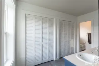 Big closets and toilet/shower beyond the door