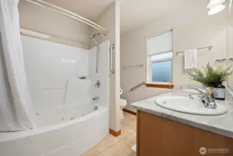 There is a large jetted tub in the primary bathroom.