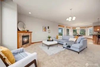 The living room is open to the kitchen and the dining area.