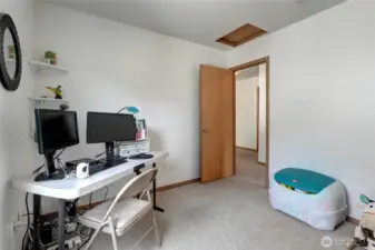 This is one of the secondary bedrooms, set up as a temporary second office and sleeping space for youngster.