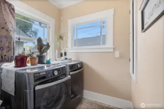 Laundry room with glass door.