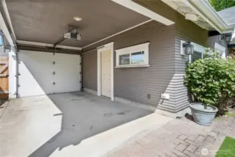 Covered space for another vehicle or storage.