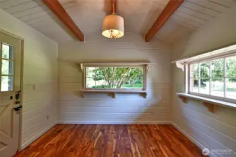 Sun room with vaulted ceilings off the dining room