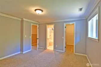 Primary bedroom toward bath and walk-in closet