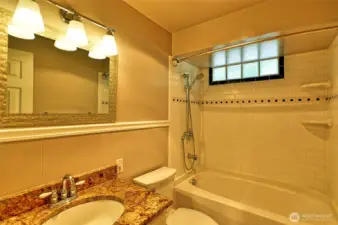 Primary bath with custom tile tub enclosure