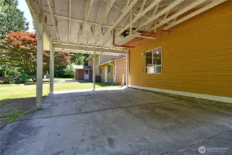 2 car carport is attached to back of the shop