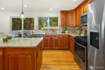Kitchen with quality cabinets, granite counters, SS appliances