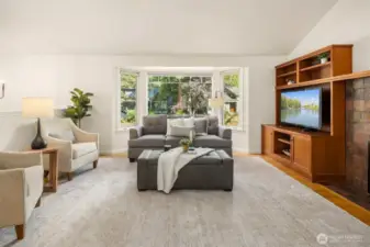 Bay window in living room looks out to the street
