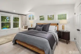 Large primary suite overlooking gardens & pool