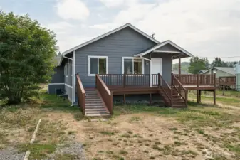 This angle shows the full picture: extra parking for RVs, boats, or whatever you’re hauling, and a yard that’s a total blank canvas. Flat and sunny, it’s ready for the landscaping you’ve been saving on Pinterest but haven’t had the yard to pull off until now.
