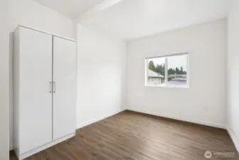 At over 17 feet long, this 5th bedroom has the square footage to double as more than just a place to sleep. Set up a lounge area on one end and a bed on the other, or claim it as a family room, TV zone, or gaming headquarters. This shot only shows half the room, which tells you how much space you’re actually working with.
