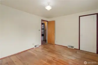 Another view of the bedroom looking out to the hallway.