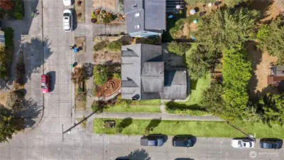 Aerial drone shot from above showcases the prime 5,000 sq.ft corner lot the home sits on.