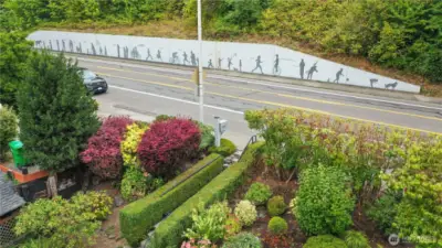 This mural is one of the East Bay Neighborhood projects. Mission Creek Restoration, street banners, solar panels and Oyster Planting to help keep Budd Bay clean.