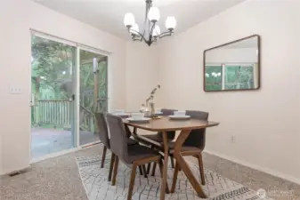 Sliding glass doors lead to huge back deck