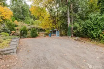 Back to the beginning…near entry is additional parking and firewood storage.