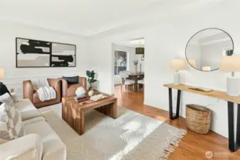 Walk further in to see the attached formal dining room. Wonderful for group dinners, hosting, holidays, and more.