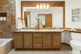 Full bath ensuite with double sinks means no sharing necessary!